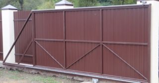 Купить откатные ворота из профнастила Советская Гавань, цена от 1788 руб.